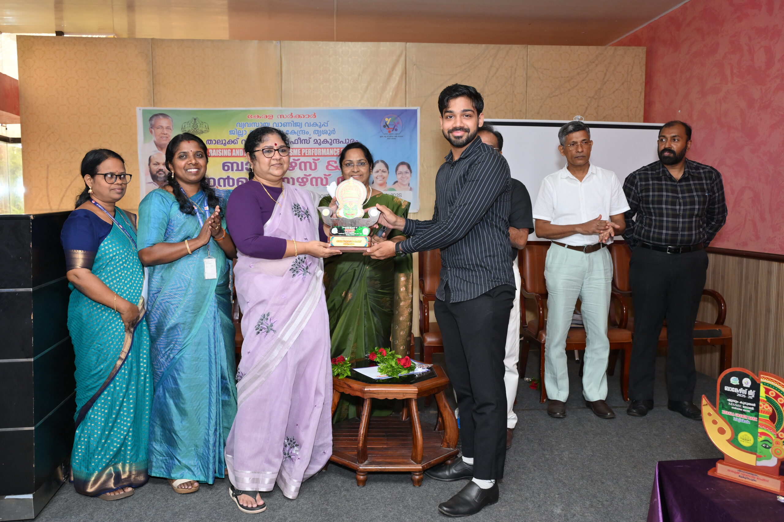 Yembroos Animal Feeds receiving the Best Entrepreneur Award from Dr. R. Bindu, Minister for Higher Education and Social Justice, Government of Kerala.